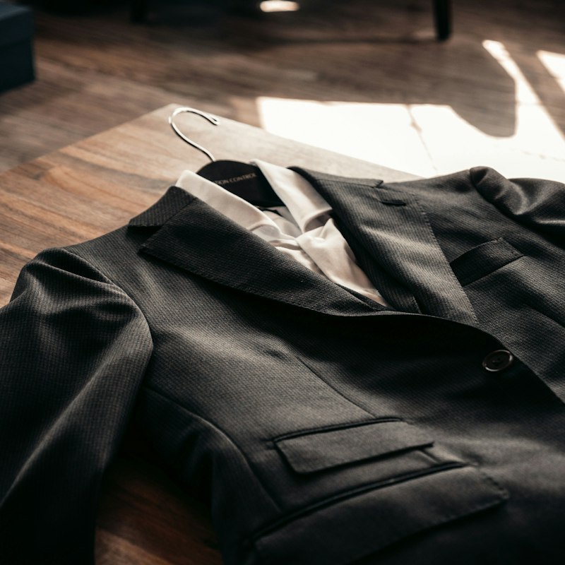 BEFORE · Suit · steam & press